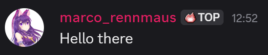An message from a user on a server. A gray badge with an fire icon and "TOP" written in capital letters, is shown next to the user's name.